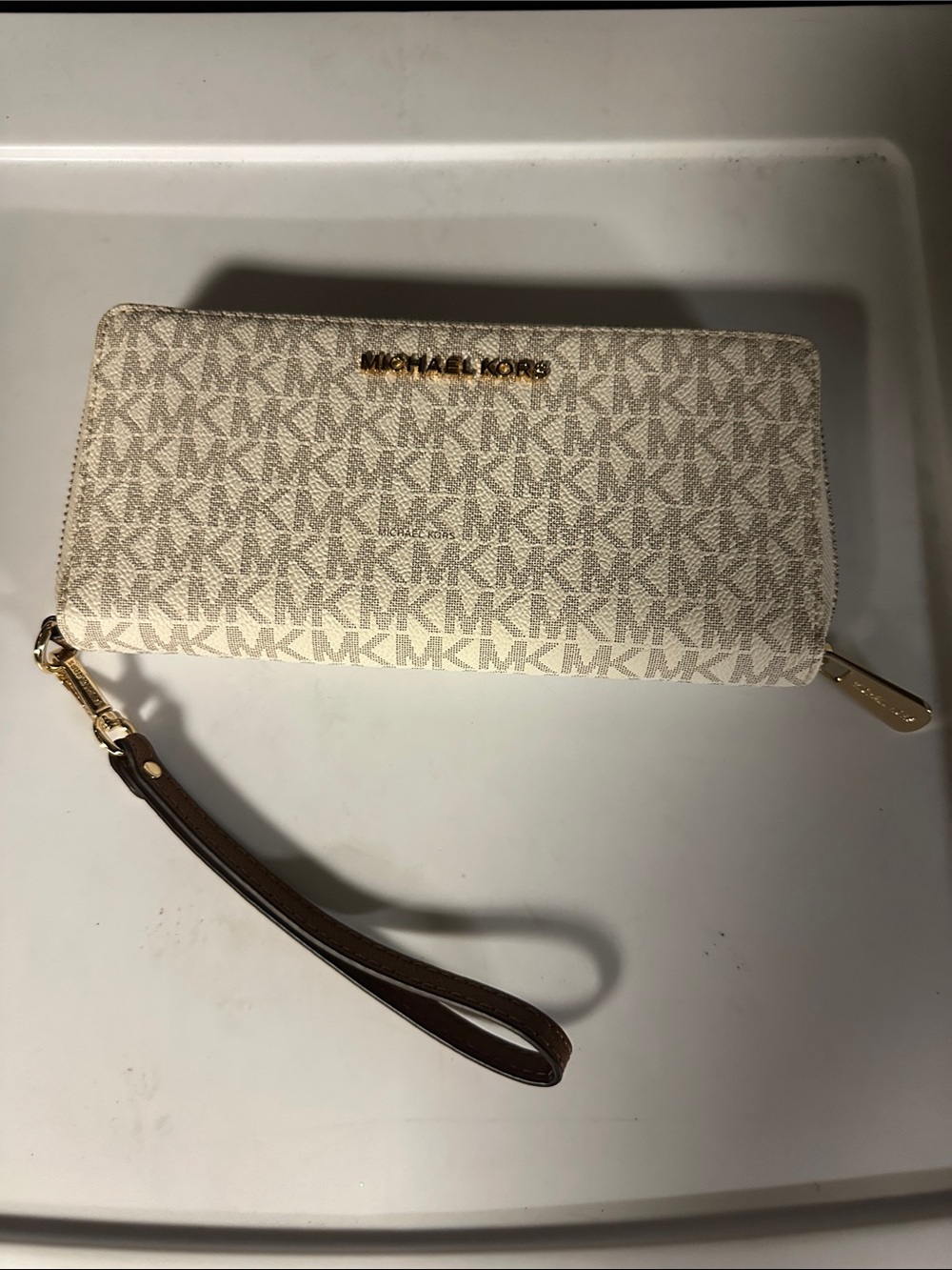 Michael Kors Ivory Logo Zip-Around Wristlet with Brown Strap